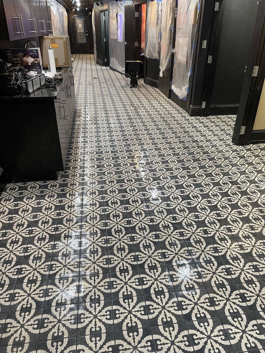 Patterned tile floor in a commercial hallway