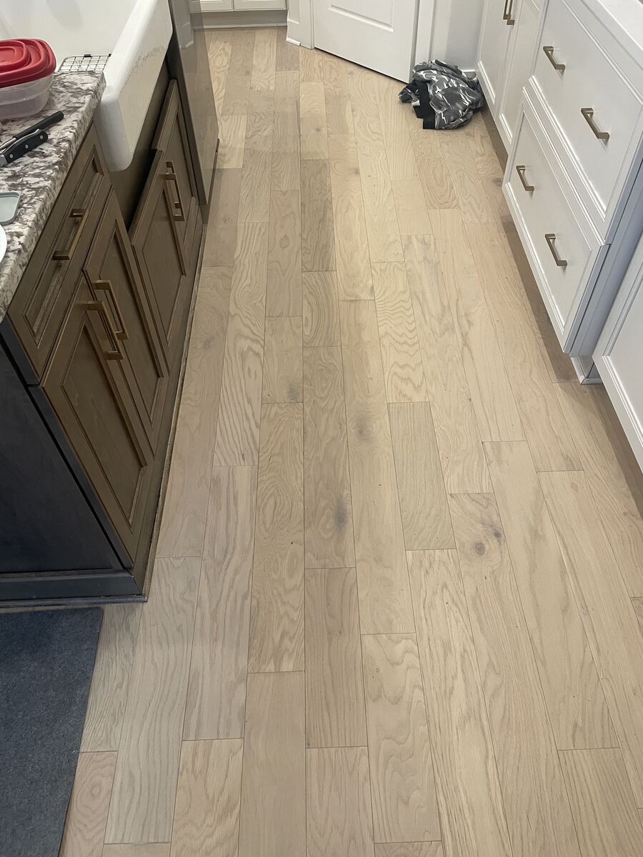 Light hardwood flooring in a kitchen