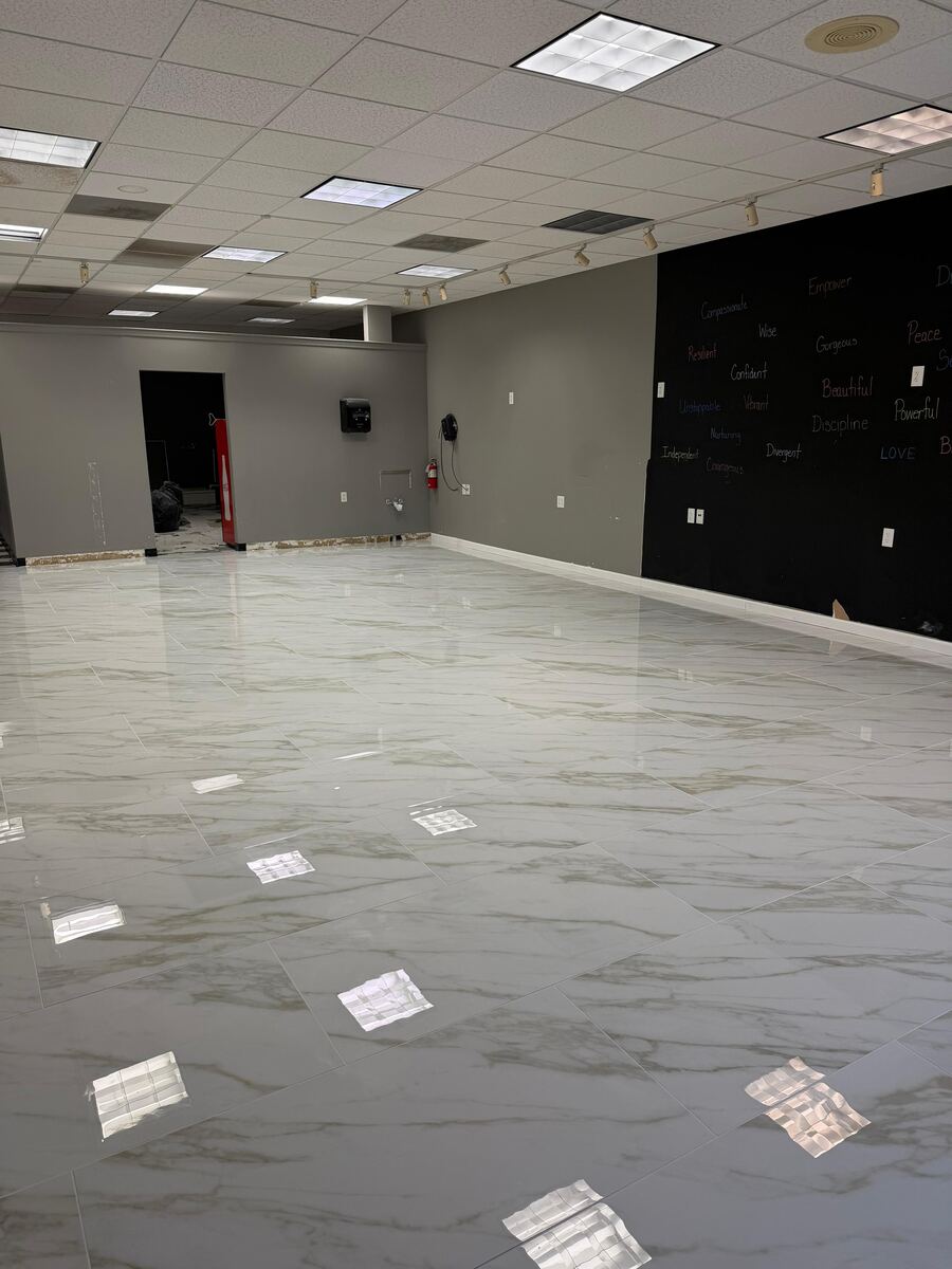 Large commercial marble-look floor installation