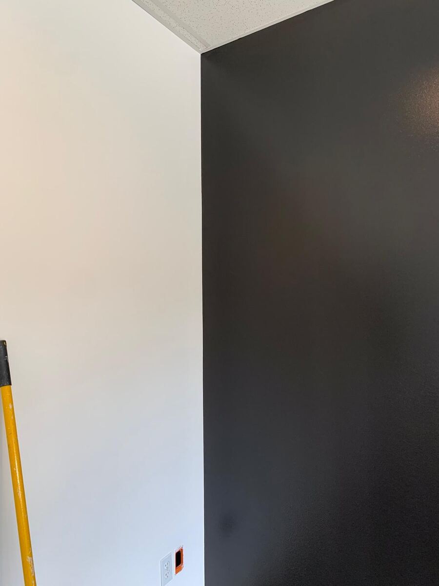 Black accent wall interior painting
